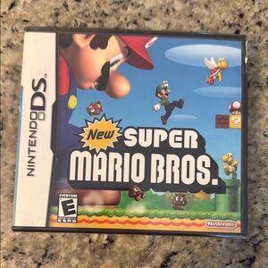 New with plastic, never usedNintendo New Super Mario Bros. for Nintendo DS - Red